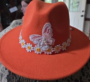 Orange Hat with Butterfly and Daisy Embellishments